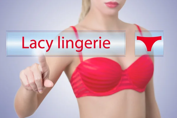 Woman pressing lacy lingerie  button — Stock Photo, Image