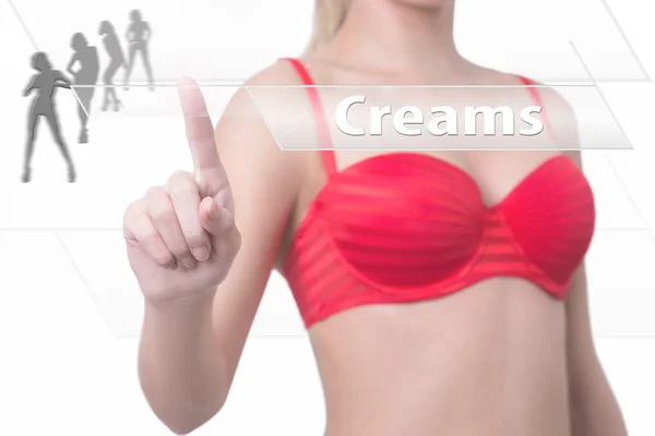 Woman pressing creams button — Stock Photo, Image