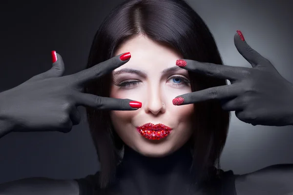 Woman with rhinestones on her lips and nails — Stock Photo, Image