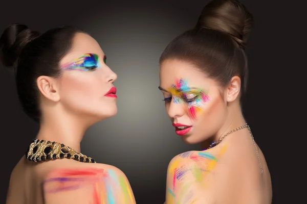 Meisjes. make-up kleur verf schilderij, — Stockfoto