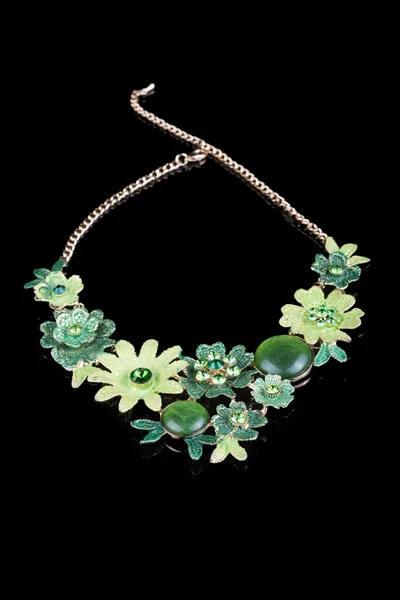 Metal feminine necklace. in the form of flowers — Stock Photo, Image