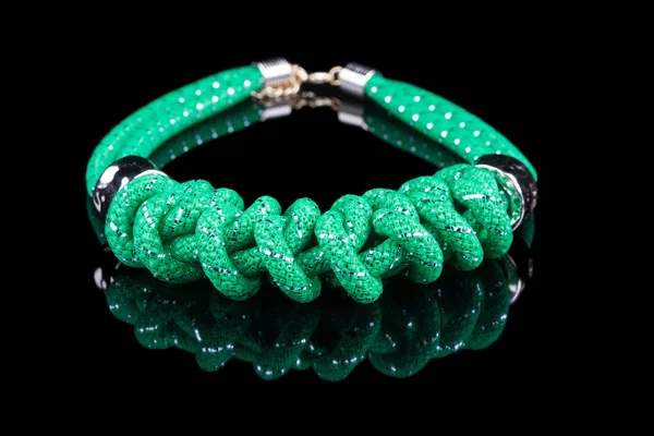 Green Rope Necklace. on black background — Stock Photo, Image