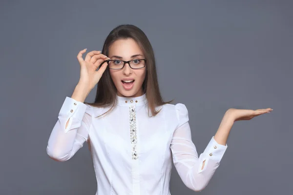 Woman pointing her finger on imaginery button — Stock Photo, Image