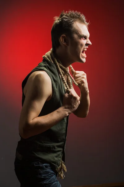 Angry man with a rope around his neck — Stock Photo, Image