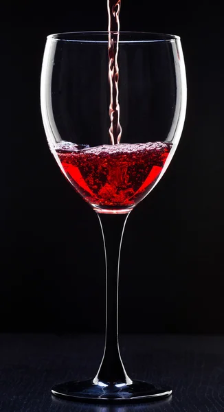 Red wine pouring — Stock Photo, Image