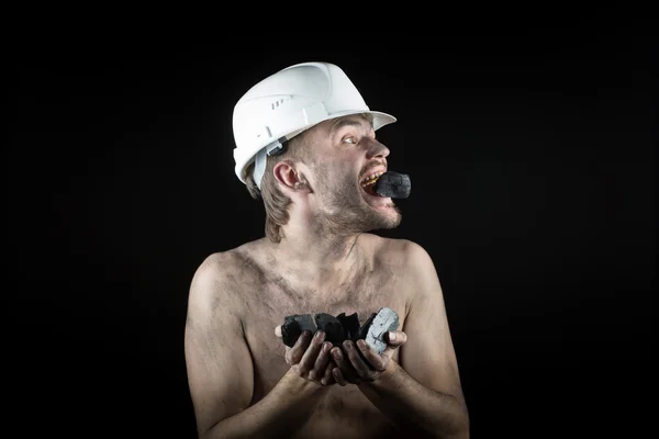 Coal miner on a black background — Stock Photo, Image