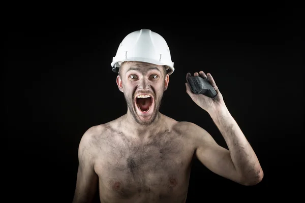 Coal miner on a black background — Stock Photo, Image