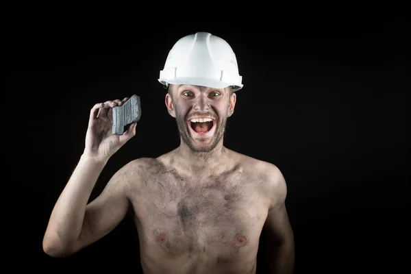 Coal miner on a black background — Stock Photo, Image