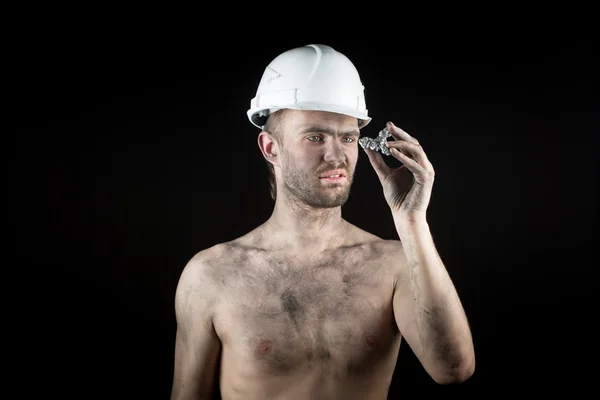 Miner shows a silver nugget — Stock Photo, Image