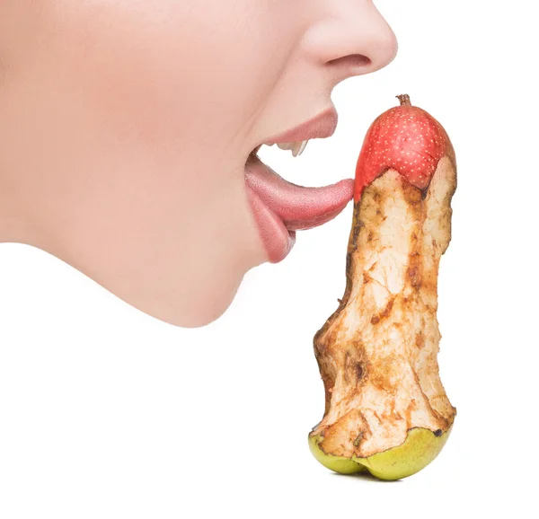 Girl touching tongue to bits of pear-like dildo — Stock Photo, Image