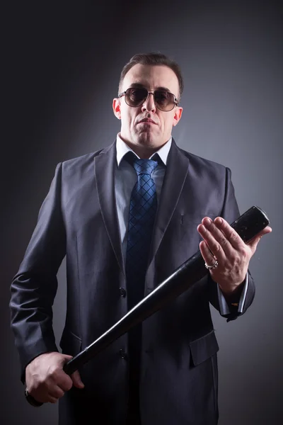 Male gangster with glasses and a baseball bat — Stock Photo, Image