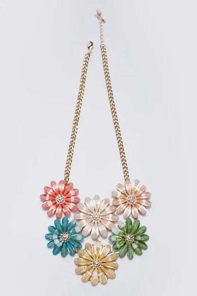 Metal feminine necklace. in the form of flowers — Stock Photo, Image