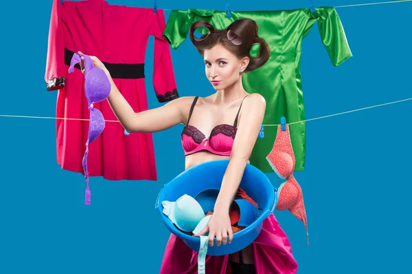 Pin-up girl with a basket with the laundry — Stock Photo, Image