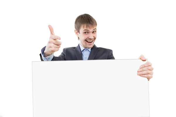 ビジネスの男性は、指空看板を示しています — ストック写真