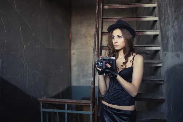 Girl with vintage camera — Stock Photo, Image