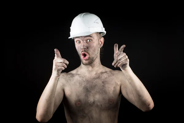 Happy dirty worker in helmet. — Stock Photo, Image