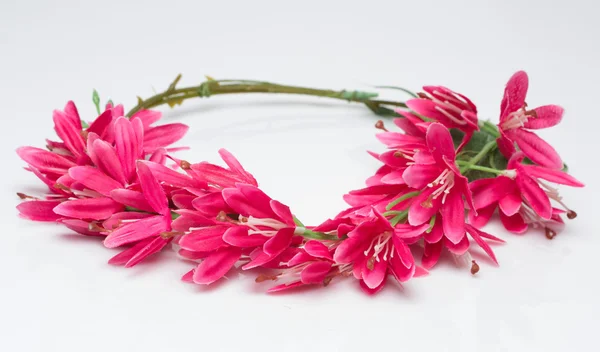 Tiara of artificial  roses on a light background — Stock Photo, Image