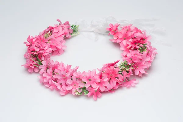 Tiara of artificial  roses on a light background — Stock Photo, Image