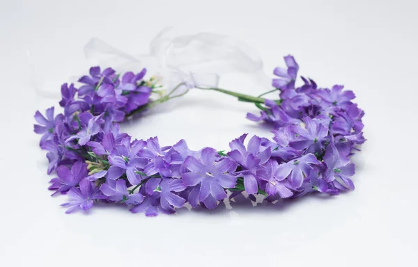 Tiara of artificial  roses on a light background — Stock Photo, Image