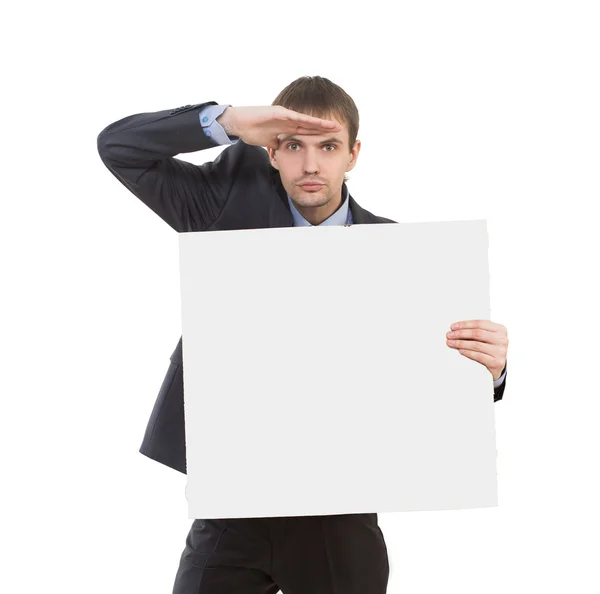 Looking smiling business man showing blank signboard — Stock Photo, Image