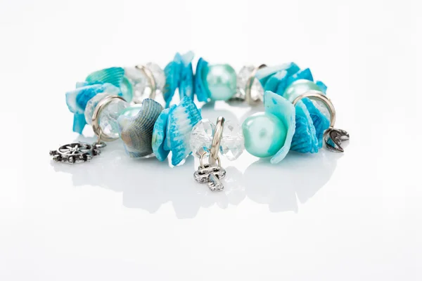 Blue bracelet with pendants — Stock Photo, Image