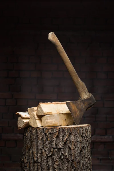 Birch firewood, old rusty ax — Stock Photo, Image