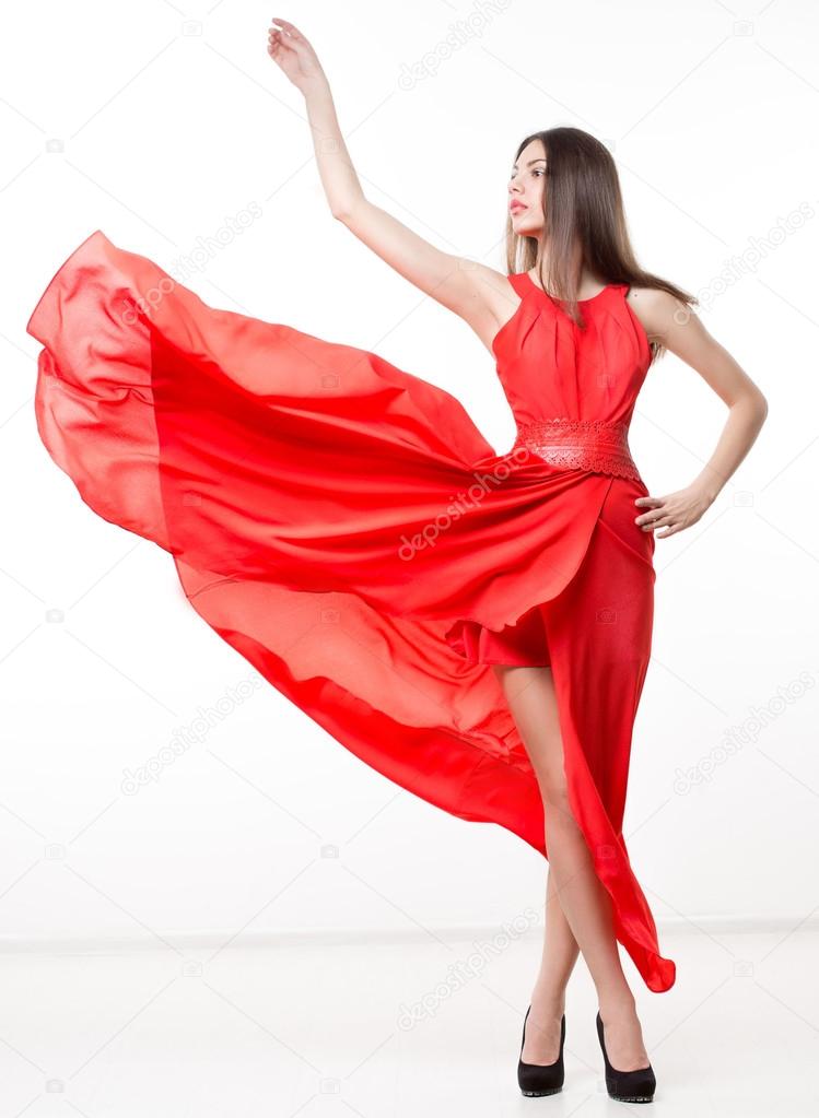 Young beauty woman in fluttering red dress. Stock Photo by ©kopitin ...