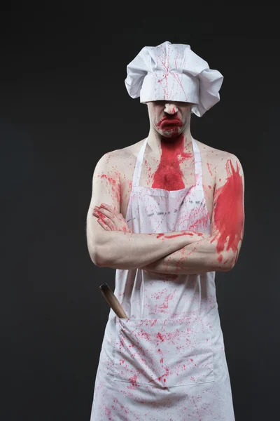 Muž, řezník. agresivní maniak kuchař v krvi — Stock fotografie