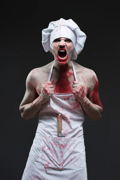 Carniceiro. chef maníaco agressivo no sangue — Fotografia de Stock