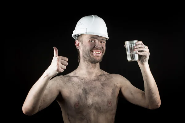 A miner with a glass of vodka — Stock Photo, Image