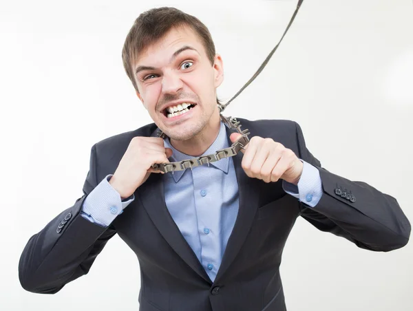 Uomo d'affari arrabbiato sulla catena con un colletto . — Foto Stock