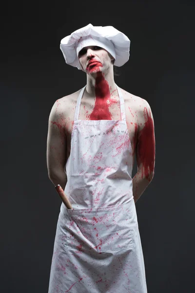 Muž, řezník. agresivní maniak kuchař v krvi — Stock fotografie