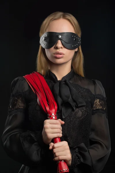Portrait of young beautiful woman in blindfold — Stock Photo, Image