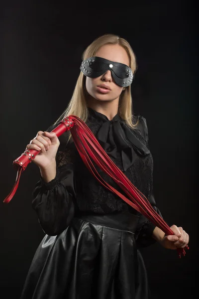 Portrait of young beautiful woman in blindfold — Stock Photo, Image