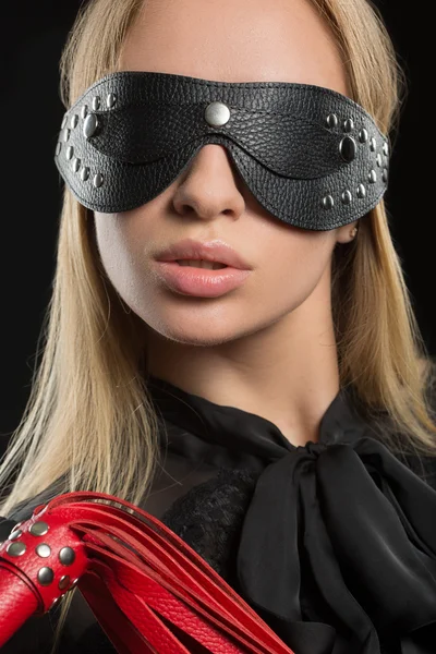 Portrait of young beautiful woman in blindfold — Stock Photo, Image