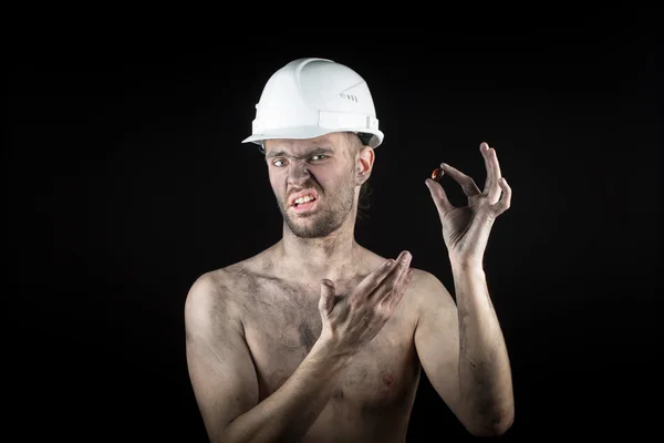 Happy dirty worker in helmet. gemstone, — Stock Photo, Image