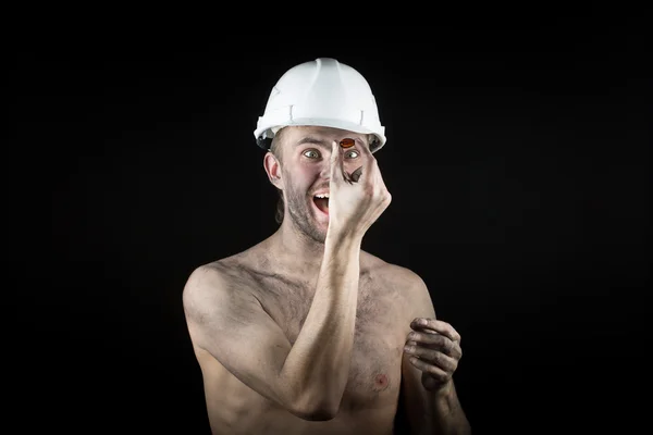 Happy dirty worker in helmet. gemstone, — Stock Photo, Image