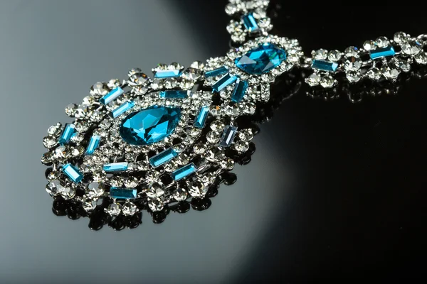 Necklace with large jewels. on black background — Stock Photo, Image