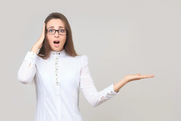 Young girl shows on the palm — Stock Photo, Image