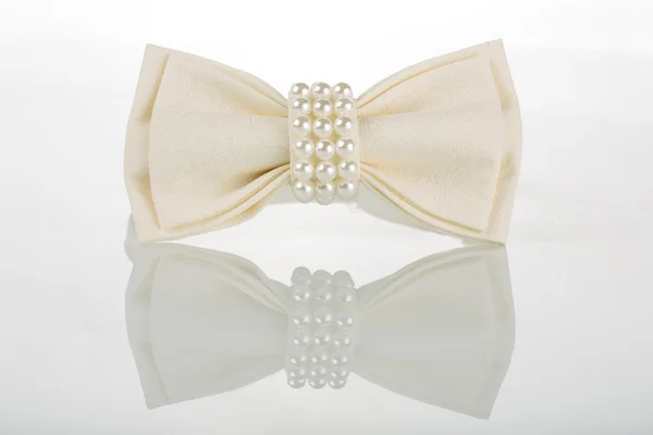 White bow tie with pearls — Stock Photo, Image