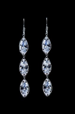 earrings with jewels on the black