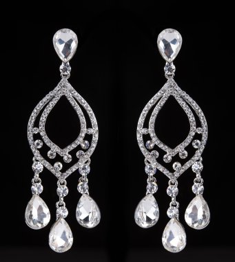 earrings with jewels on the black