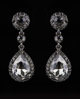 earrings with jewels on the black