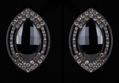 earrings with jewels on the black