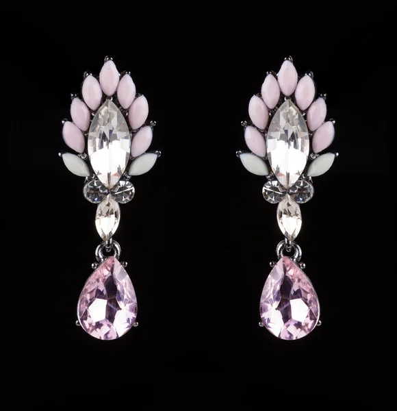 Earrings with jewels on the black — 스톡 사진