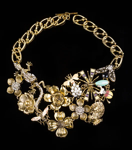 Luxury necklace of plastic flowers on black stand — 스톡 사진