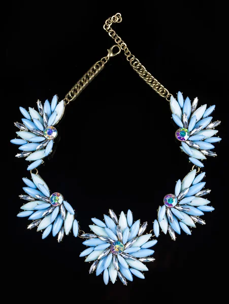 Luxury necklace of plastic flowers on black stand — 스톡 사진