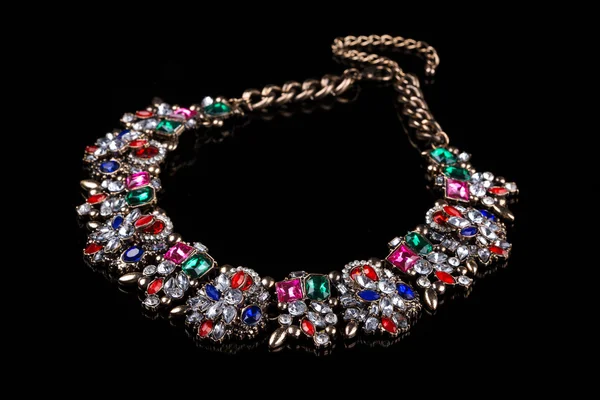 Luxury red necklace on black stand — Zdjęcie stockowe