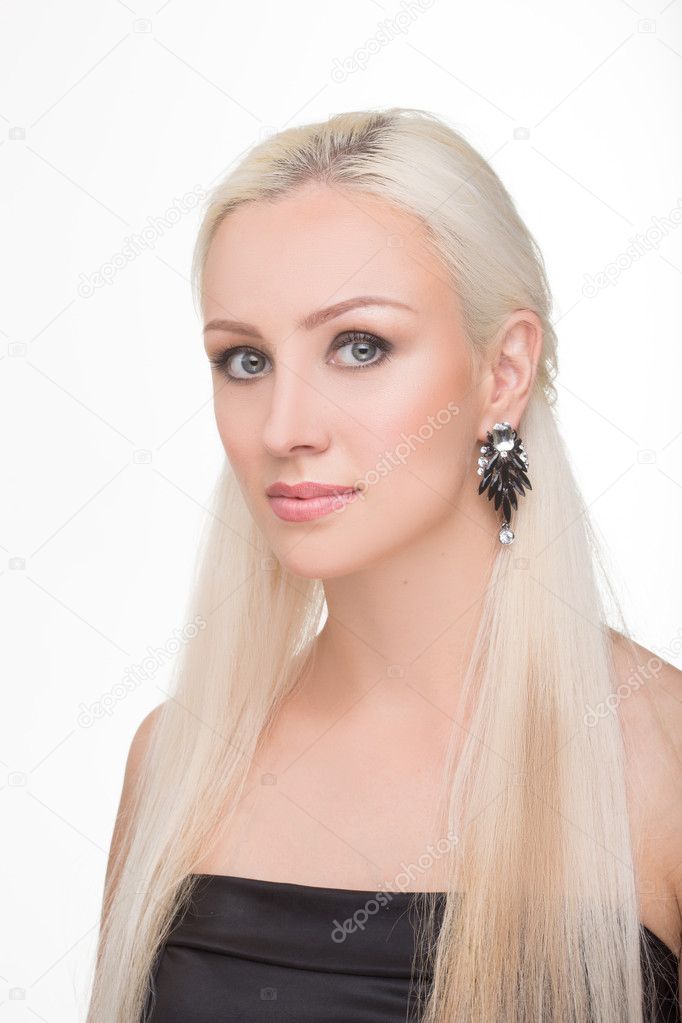 beautiful girl with long white hair and black earrings. fashionable photo. portrait