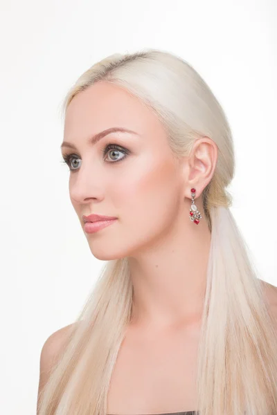 Beautiful girl with long white hair and earrings. fashionable photo. portrait — Stock Photo, Image